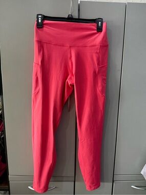 Nike Women's Coral Pink High-Rise Leggings with Side Pockets